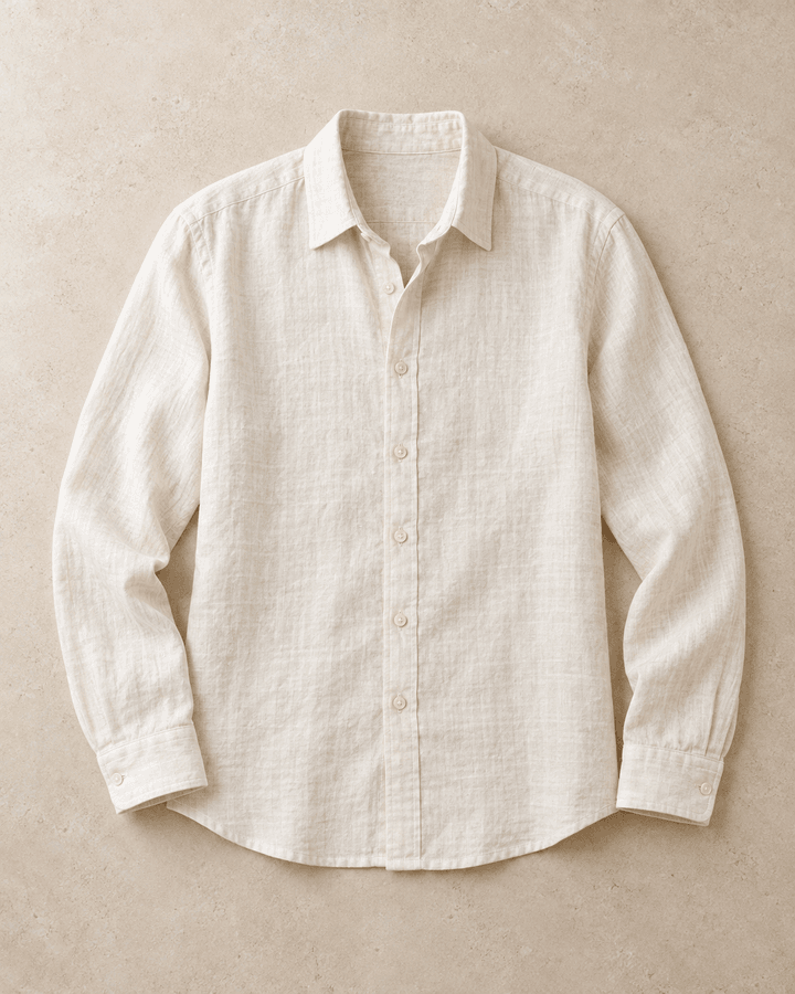 Ivory linen shirt with long sleeves, laid flat